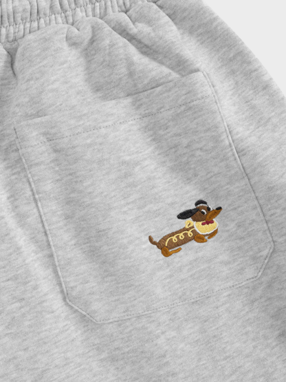 Carol | Pantalones de chándal barrel con perritos bordados