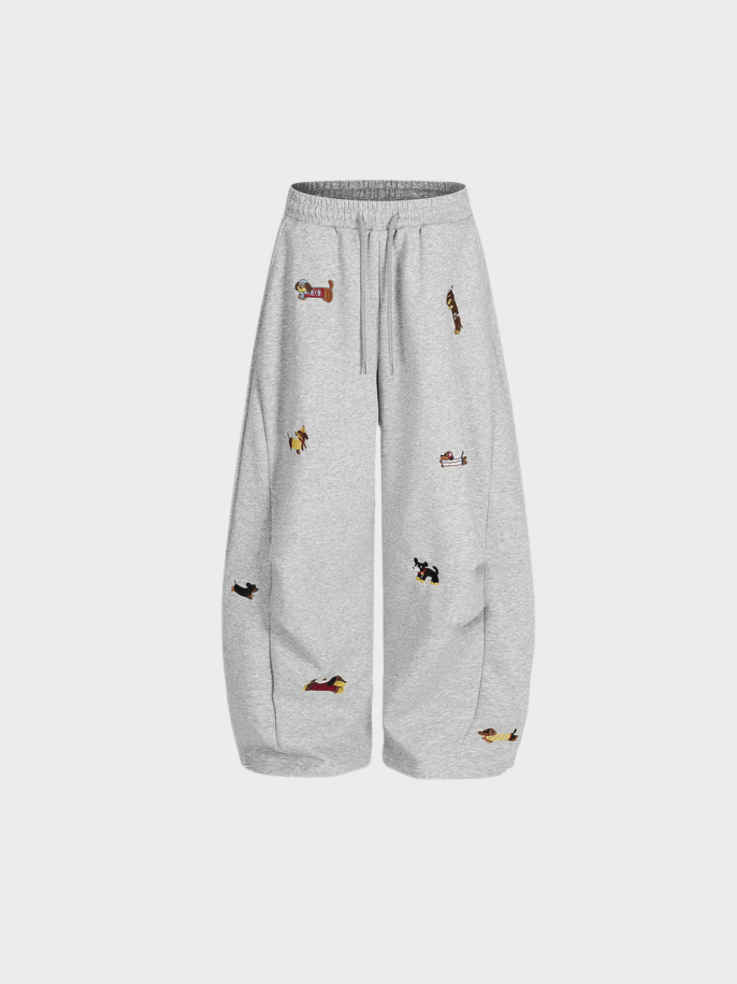 Carol | Pantalones de chándal barrel con perritos bordados