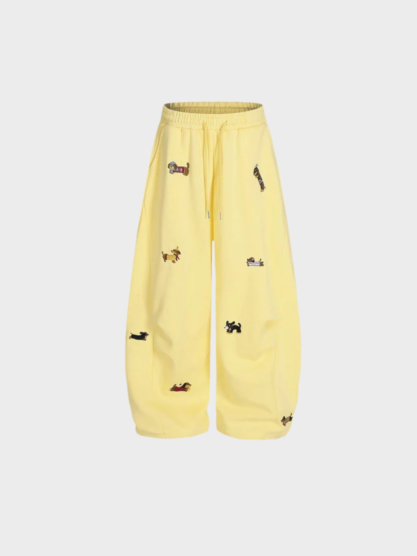 Carol | Pantalones de chándal barrel con perritos bordados