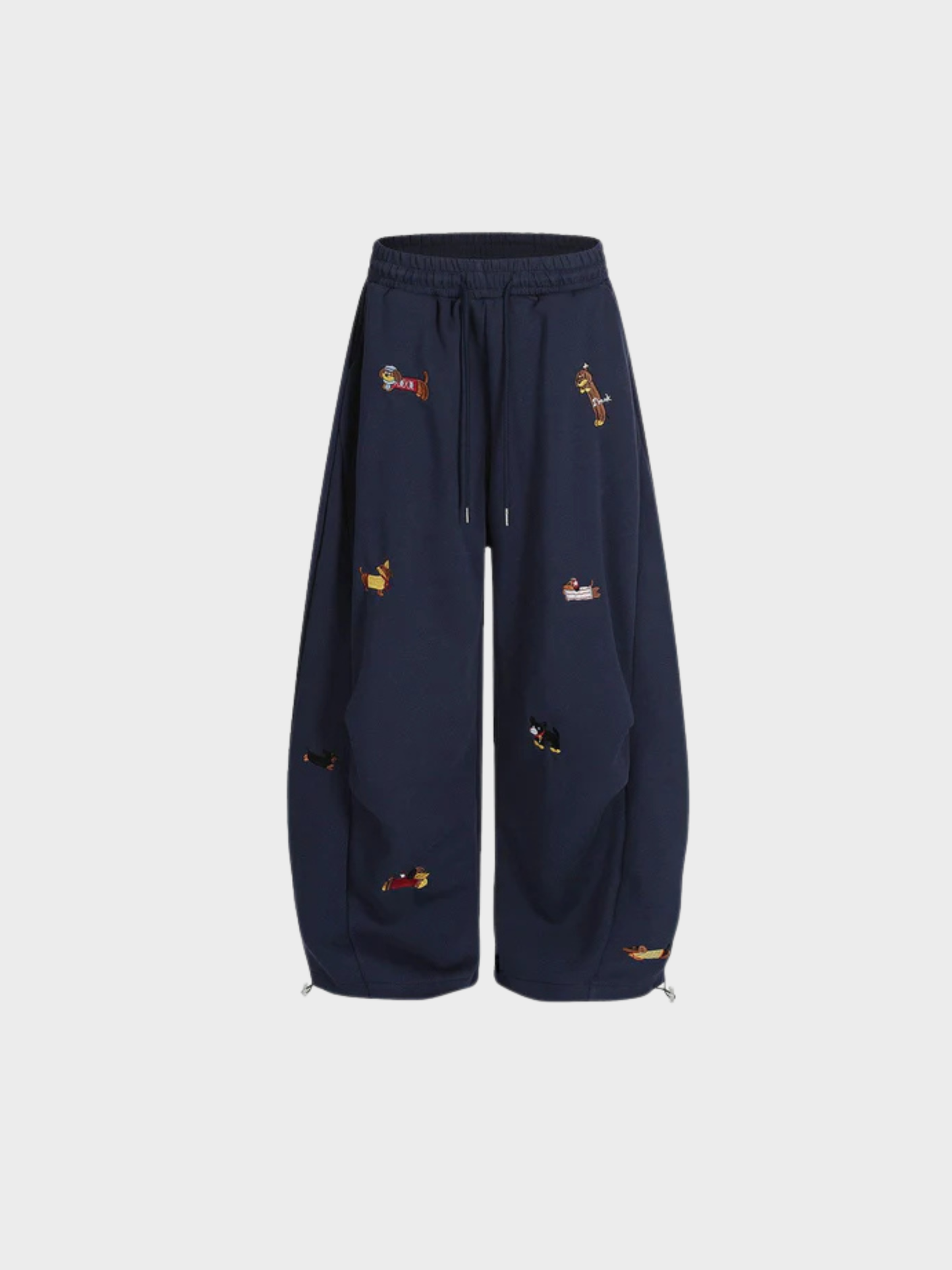 Carol | Pantalones de chándal barrel con perritos bordados